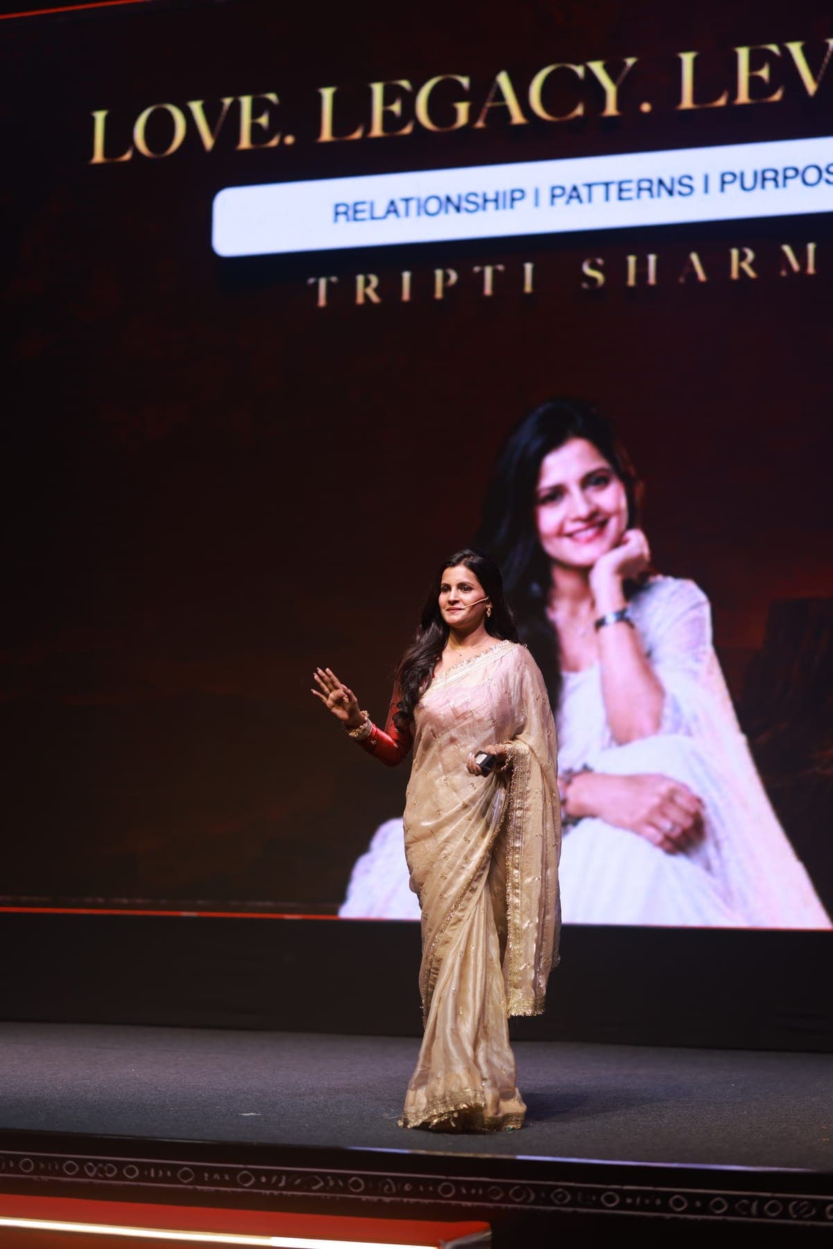 Tripti Sharma on stage at her Love. Legacy. Leverage. keynote