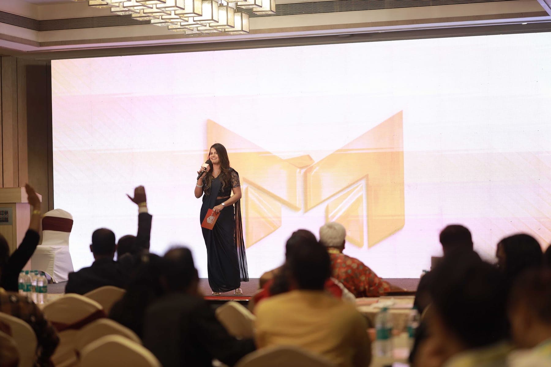 Tripti teaching an engaged audience