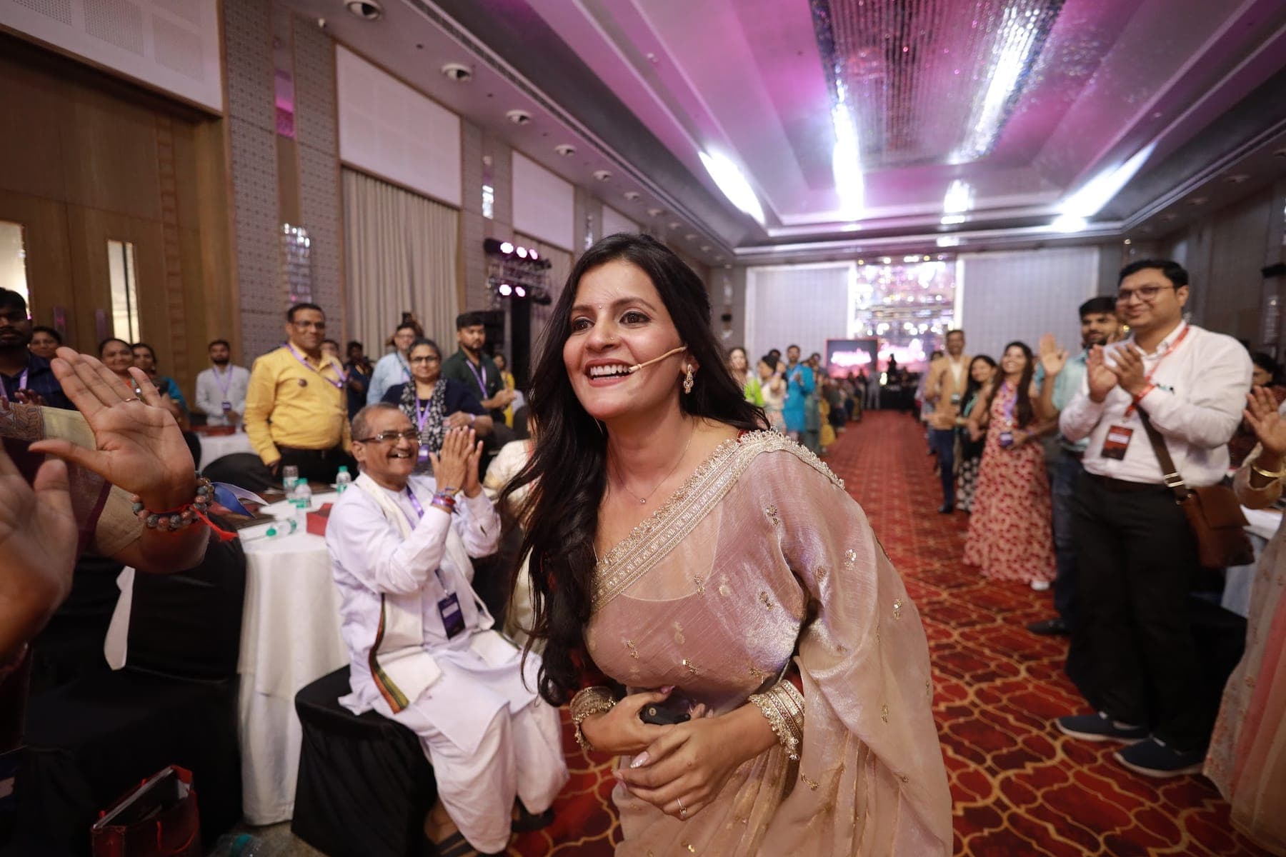 Tripti laughing with participants